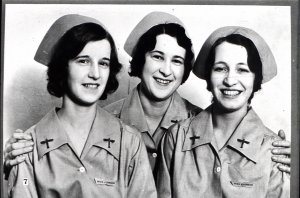 So popular were the original eight girls that 20 more soon were recruited. Here is a close-up of three of them. Shortly after they were empl