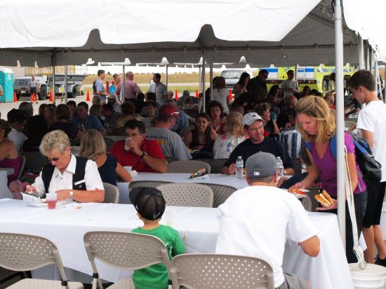 Employees relax and enjoy the buffet lunch that was served.
