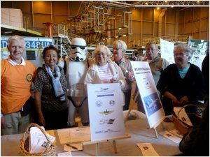 Left - UAHF volunteers pose with a Star Wars-like storm trooper called TK2304 who was a special guest at the event. Left to right: Dan Niels