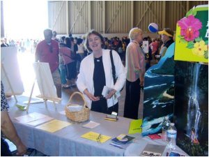 UAHF Secretary Georgia Nielsen gets ready to pass out brochures to some of the nearly 16,000 attendees of the Family Day event.