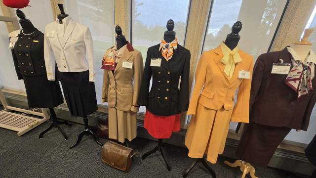 Flight attendant uniforms spanning several eras